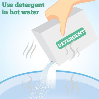 use detergent in hot water to remove spray paint
