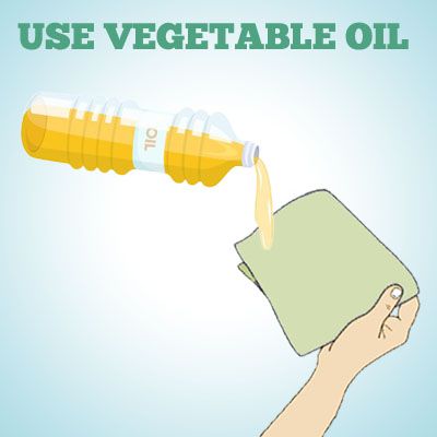 use vegetable oil to remove spray paint